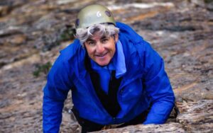 Happy middle-age rock climber in Santa Barbara